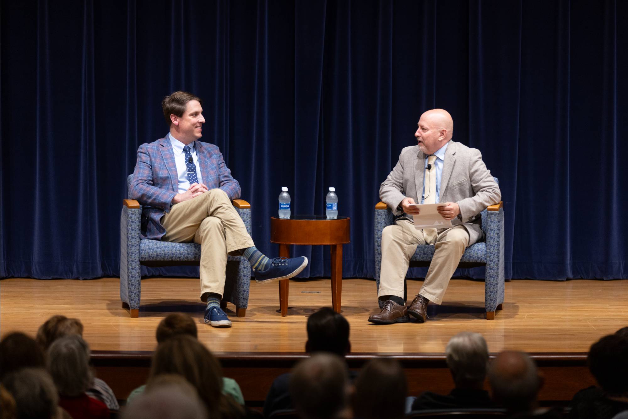 Speakers in conversation